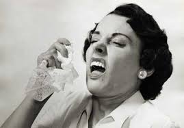 Woman Sneezing